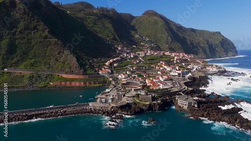 Aerial Drone Shot Approaching Porto Moniz Town on Madeira Island, Portugal.