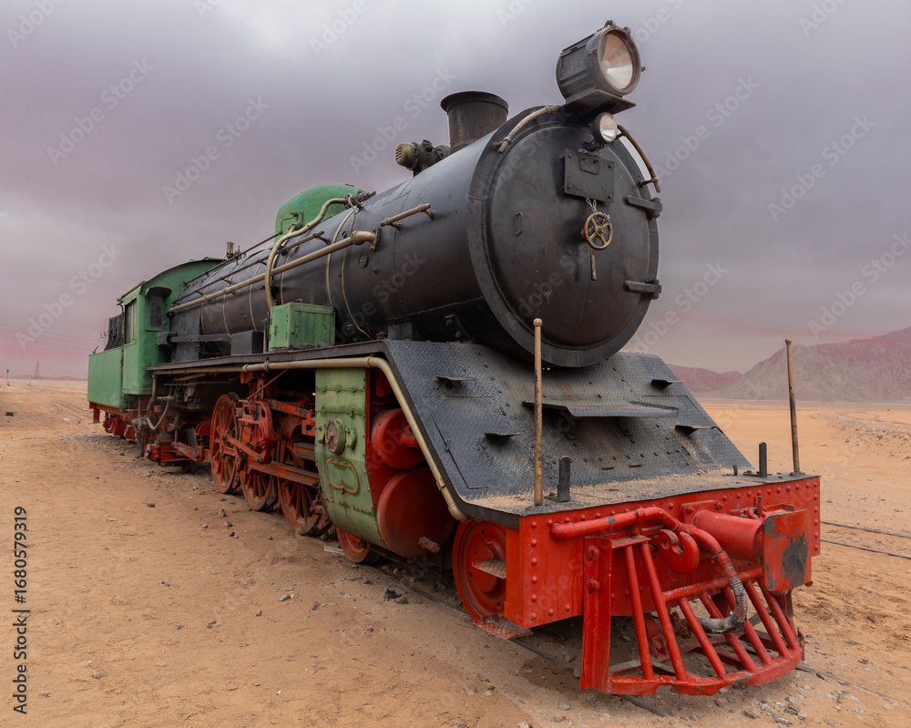 Fototapeta premium Vintage steam engine in the desert in Jordan