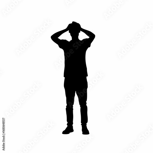 Silhouette of a frustrated young man with laughing friends in the background