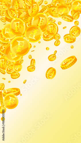 Swiss franc coins falling. Gold scattered CHF