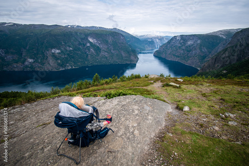 Baby traveler with fjord view