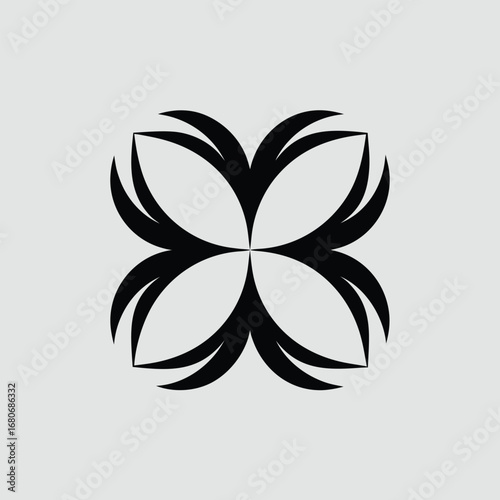 A black and white abstract flower or leaf design on a square background