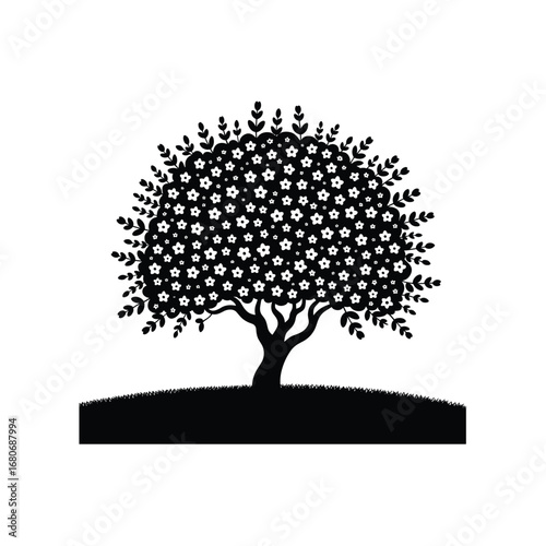 Stylized silhouette of a blooming tree on a hilltop in black and white