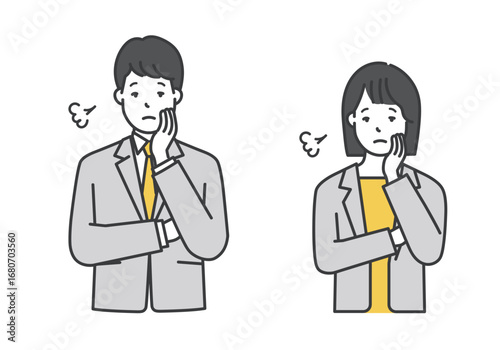 ため息をつく困り顔の男女ビジネスパーソン