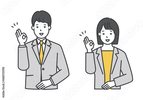 笑顔でポーズをとる男女ビジネスパーソン