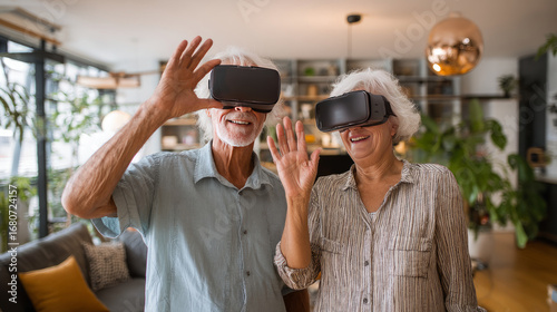 Wallpaper Mural VR, gaming and metaverse with a senior couple playing a video game in their home for fun together. 3d, virtual reality and internet with an elderly gamer and his wife enjoying an immersive experience Torontodigital.ca