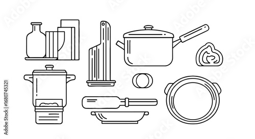 Kitchen utensils and cookware are displayed. Cooking supplies, kitchenware, food preparation, culinary tools, equipment, home, domestic, lifestyle