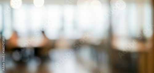 Wallpaper Mural Blurred office interior with people at tables and large windows in background, suggesting a collaborative modern workspace that feels professional, open, and productive. Torontodigital.ca