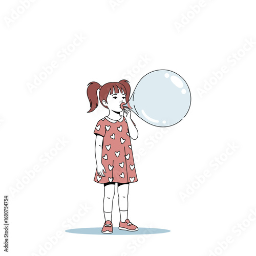 A little girl with pigtails blows a large bubble with a cheerful expression enjoying her playtime