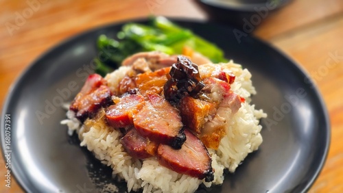 Chepo rice is Roasted duck crispy pork belly and roasted pork with rice. Street food Thai.