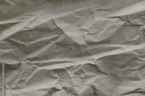 Brown crumpled recycled paper texture background. Kraft Paper