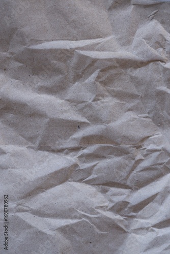 Brown crumpled recycled paper texture background. Kraft Paper