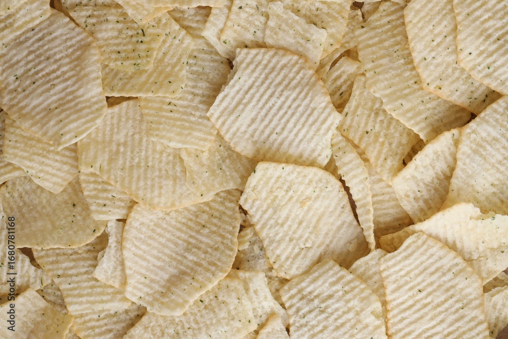 Obraz premium Homemade Flavored Paprika Potato Chips in a Bowl, top view. Flat lay