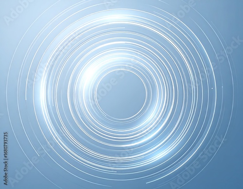 Abstract design featuring concentric circles with luminous, light trails.