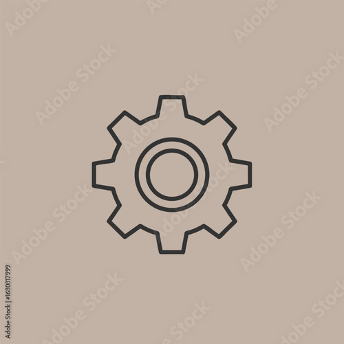 Simple gear icon on a soft beige background, symbolizing mechanics and engineering concepts for design projects