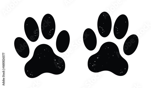 Two black paw prints with distinct toe pads and a larger heel pad isolated on white background