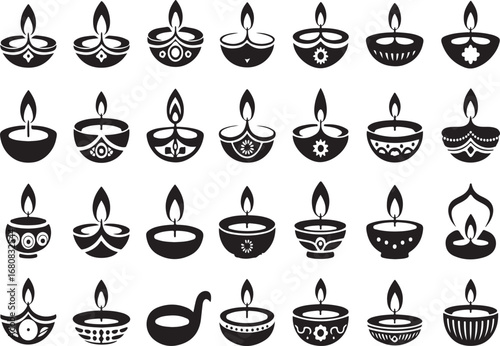 Assortment of black silhouette Diwali diyas and decorative elements on white lamp oil lamp