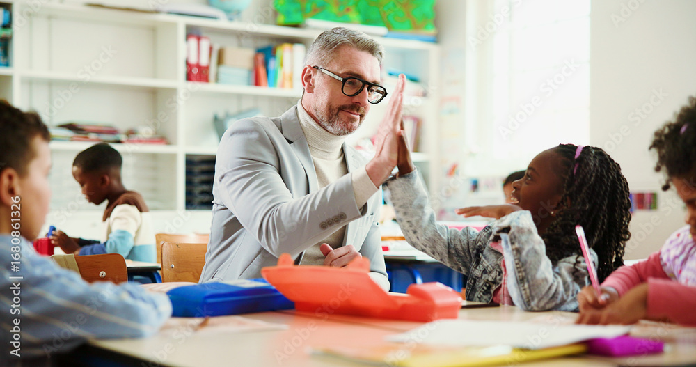 Obraz premium Teacher, girl and high five for motivation in classroom with lesson, support and education at academy. Mature man, kids and celebration with goal, quiz or happy for success with achievement at school