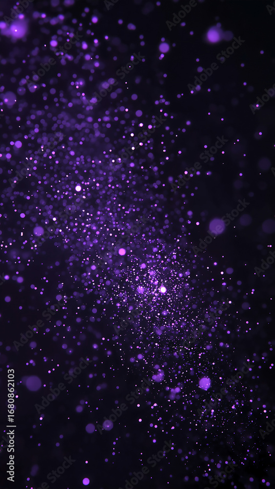 Fototapeta premium Abstract purple particles floating on a dark background, glowing dust and bokeh texture with dreamy cosmic feel, ideal for wallpaper, poster, or digital design.