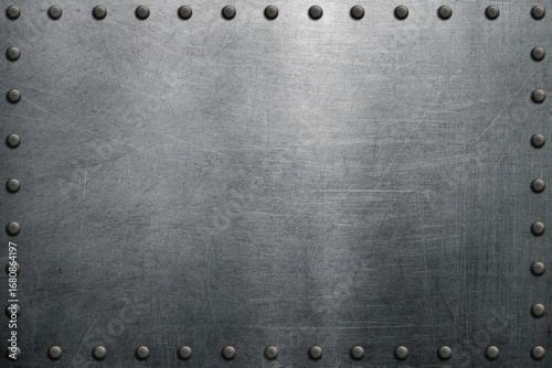 Metal background with rivets, polished steel texture