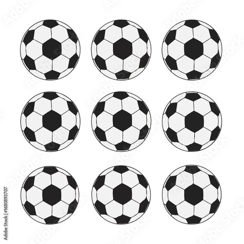Collection of nine classic black and white soccer balls arranged in a grid on a white background