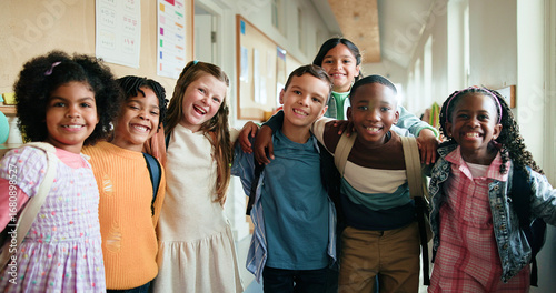 Fotografie Portrait, group and happy children hug for education, teamwork or smile in elementary school