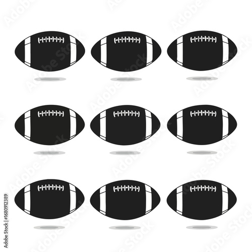 Collection of nine classic black american footballs arranged in a grid pattern on a white background