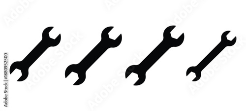 Four Black Silhouettes Of Open End Wrenches Arranged Diagonally On White tool hardware