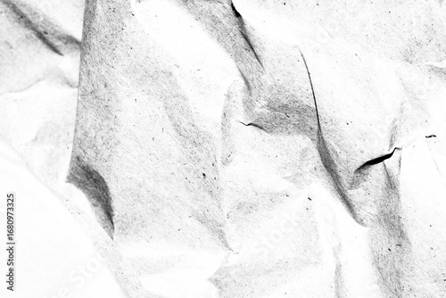 Abstract grunge black and white distressed texture torn crumpled paper overlay background
