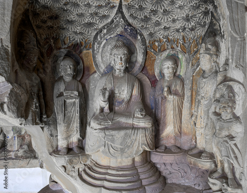 Fotografie Relief of Buddha and Bodhisattvas in a niche at Cave 38 in Giant Buddha Building at Huangze Temple in Guangyuan, Sichuan, China, only Buddhist temple dedicated to Empress Wu Zetian in Tang Dynasty