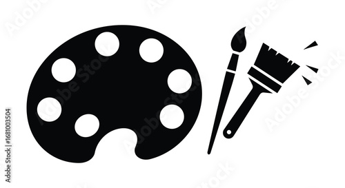A black and white image of paintbrushes and palette