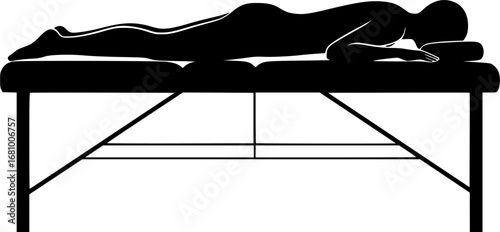 person lying on a massage table silhouette