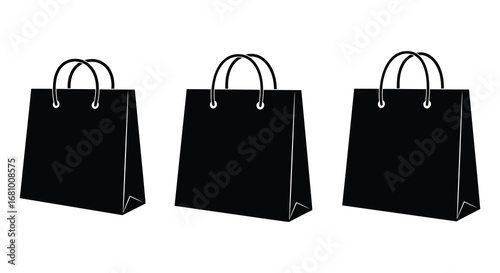 Three black shopping bags with handles on a white background