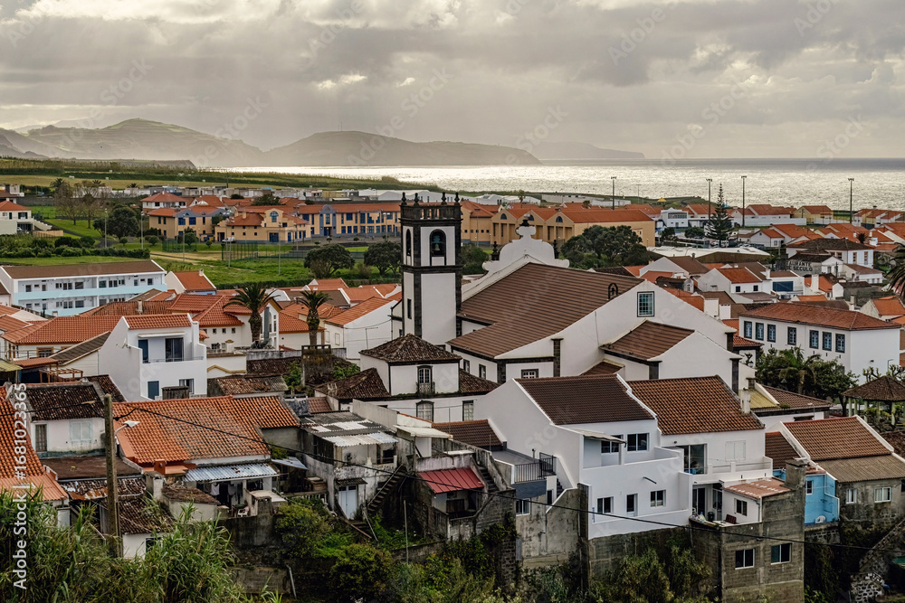 Fototapeta premium Coastal town with small houses in San Miguel island Azores, Portugal