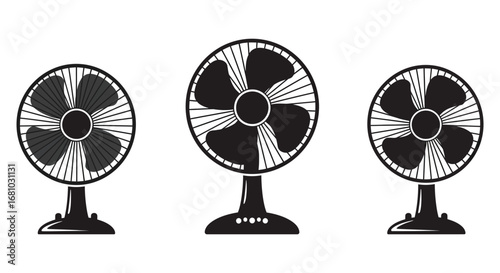 Three black and white electric fans on stands in different angles silhouette