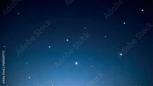 A clear night sky filled with countless bright stars and constellations visible against the deep blue expanse, evoking a sense of wonder and the vastness of the universe