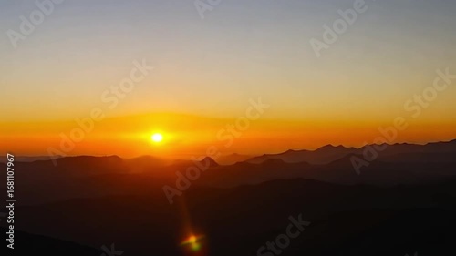 Majestic Sunrise Over Mountain Ranges