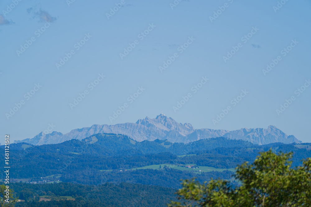 Obraz premium Scenic view of Glatt valley with Alpstein mountains in the background seen from Swiss city of Zürich on a sunny summer day. Photo taken August 31st, 2025, Zurich Schwamendingen, Switzerland.