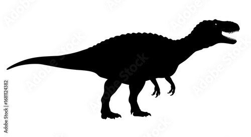 Silhouette of a fearsome spinosaurus dinosaur with its mouth open roaring in prehistoric times