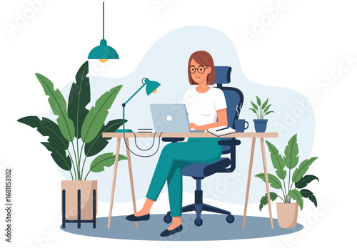 Woman working on laptop at home office with plants