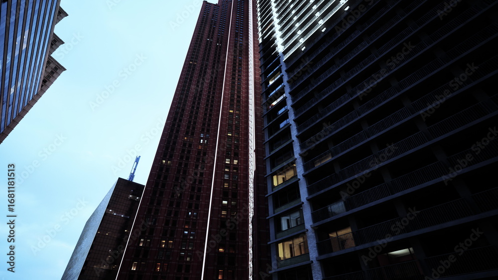 Naklejka premium Two awe-inspiring skyscrapers stand side by side, creating a captivating symphony of architecture and urban marvel.