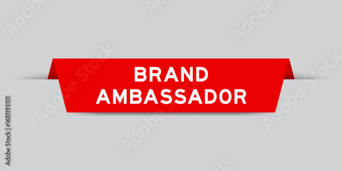 Fotografía Red color inserted label with word brand ambassador on gray background