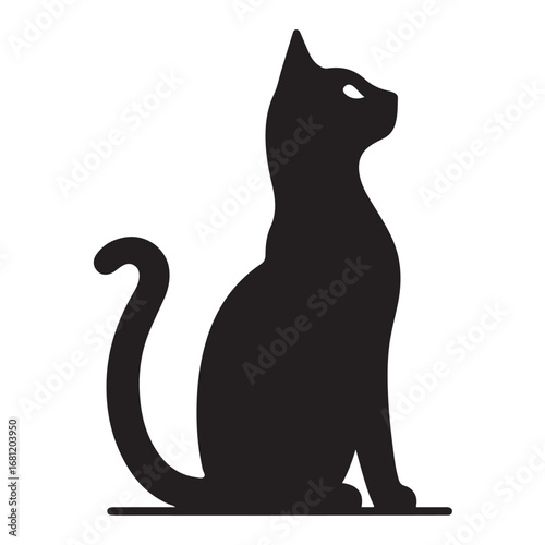A graceful cat sitting in a dark silhouette