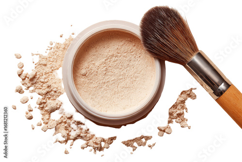 Light beige pressed powder in a round container, with a makeup brush.  Powder spills around the container