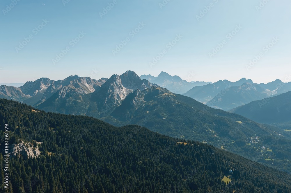 Fototapeta premium Panoramic vista of alpine mountain outlines
