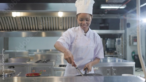 female chef is cooking in the kitchen