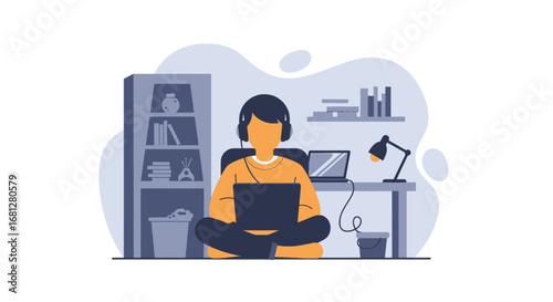 A focused person in headphones works remotely on a laptop, sitting comfortably at home. Ideal for concepts of online learning, freelance work, and digital lifestyle.