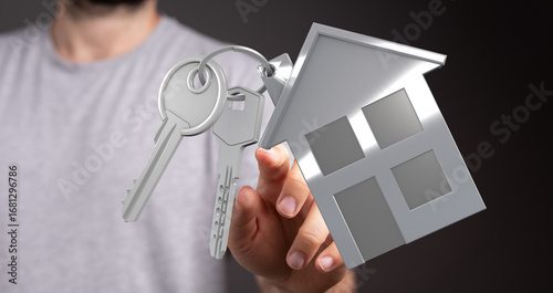 Hand holding house keys and...