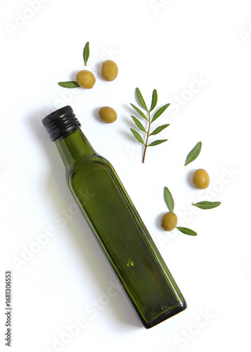 olive oil in a bottle on a white background top view.. Vertical photo format