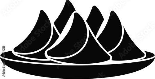 Black silhouette of samosas on a plate